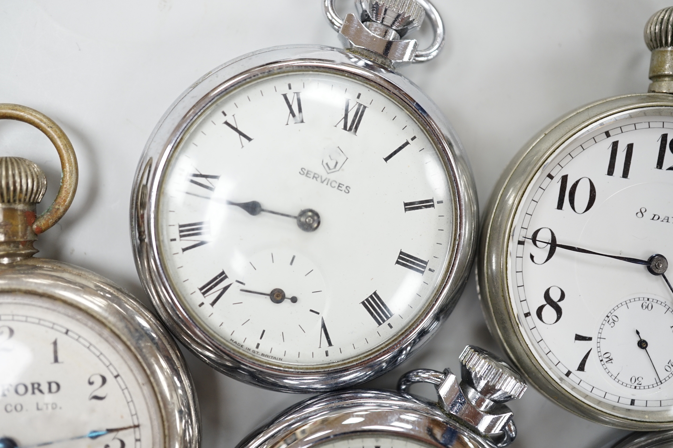 Ten assorted base metal pocket watches including Ingersoll and Smiths.